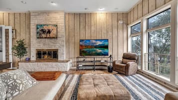 Smart TV, fireplace, foosball, books
