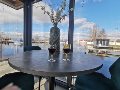 Rent a Luxury Houseboat in and on the water in the water sports village of Heeg!