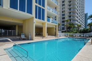 A heated pool - Island Fantasea | ๐ Gulf-Front Condo + Platinum Beach Service + Pool Access โ๏ธ (Navarre)