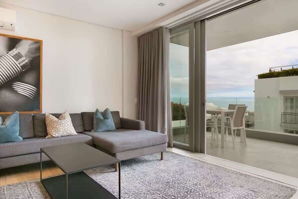 Apartment, Multiple Beds, Patio, Ocean View (Luxury Apartment ) | Living area | 42-inch flat-screen TV with digital channels, fireplace