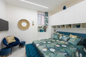 1 slaapkamer, een strijkplank/strijkijzer, internet, beddengoed