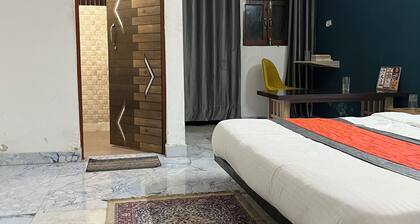 Cozy 1-bedroom apartment in fantastic Faridabad with WiFi, AC and work tabel