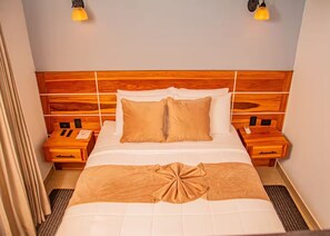 1 chambre, coffres-forts dans les chambres, fer et planche à repasser