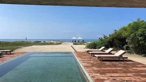 Mariana 1 , beach front home