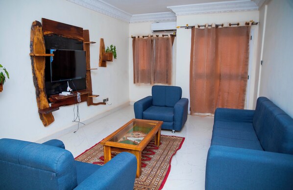 Comfort Apartment, 3 Bedrooms, Balcony, City View | Individually decorated, individually furnished, free WiFi - TOURACO SUITE HOTEL BUSINESS (Mbour)