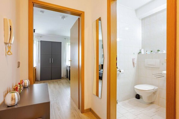 Shower, towels, soap, toilet paper