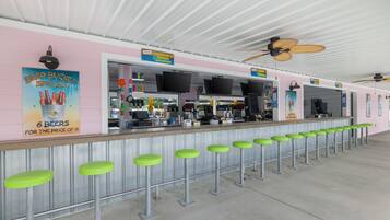 5 bars/lounges, 2 swim-up bars
