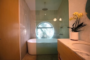 Shower, hair dryer, towels, soap