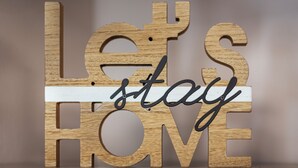 A wooden sign with the words "Let's Stay Home" cut out. - Elegant tourist accommodation facing metro C (Roma)