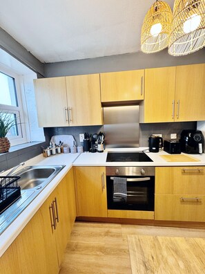 Fridge, microwave, oven, dining tables