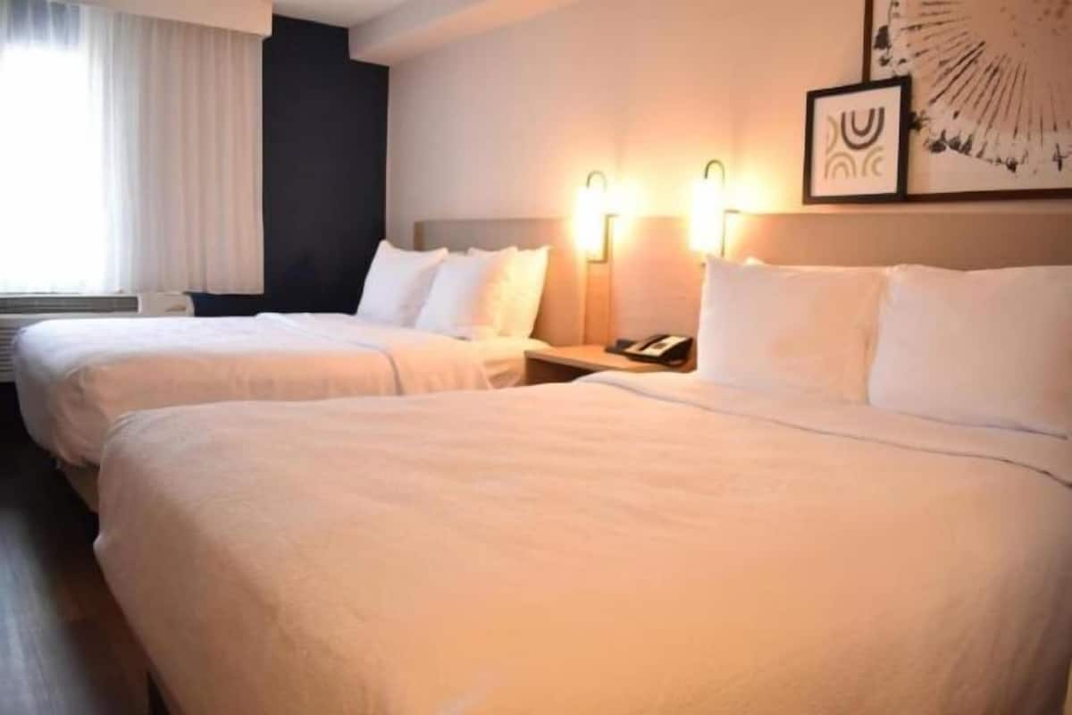 Desk, laptop workspace, free WiFi, bed sheets