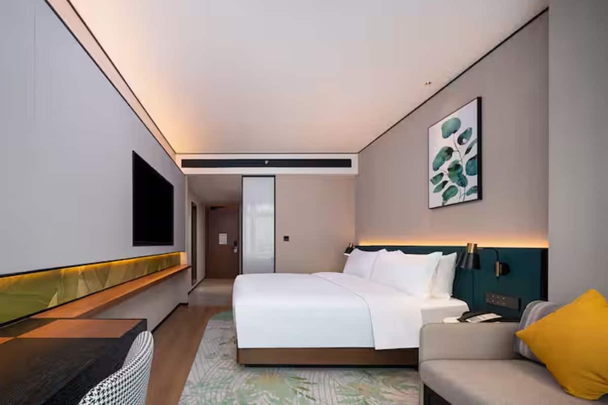 Down comforters, pillowtop beds, minibar (free items), desk