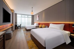Cubrecamas, colchones con pillow-top y minibar con artículos gratuitos 