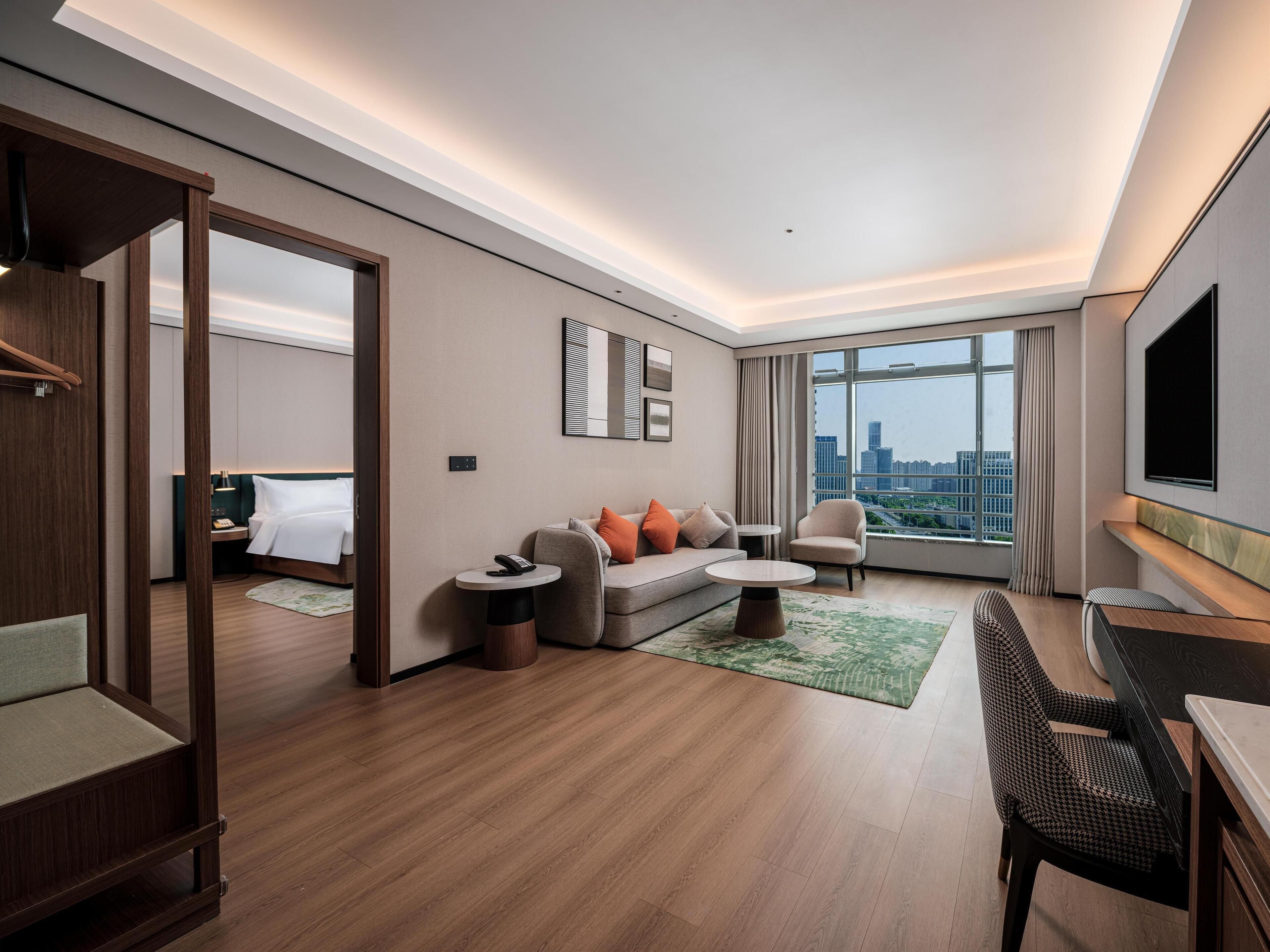 Down duvets, pillow-top beds, free minibar, desk