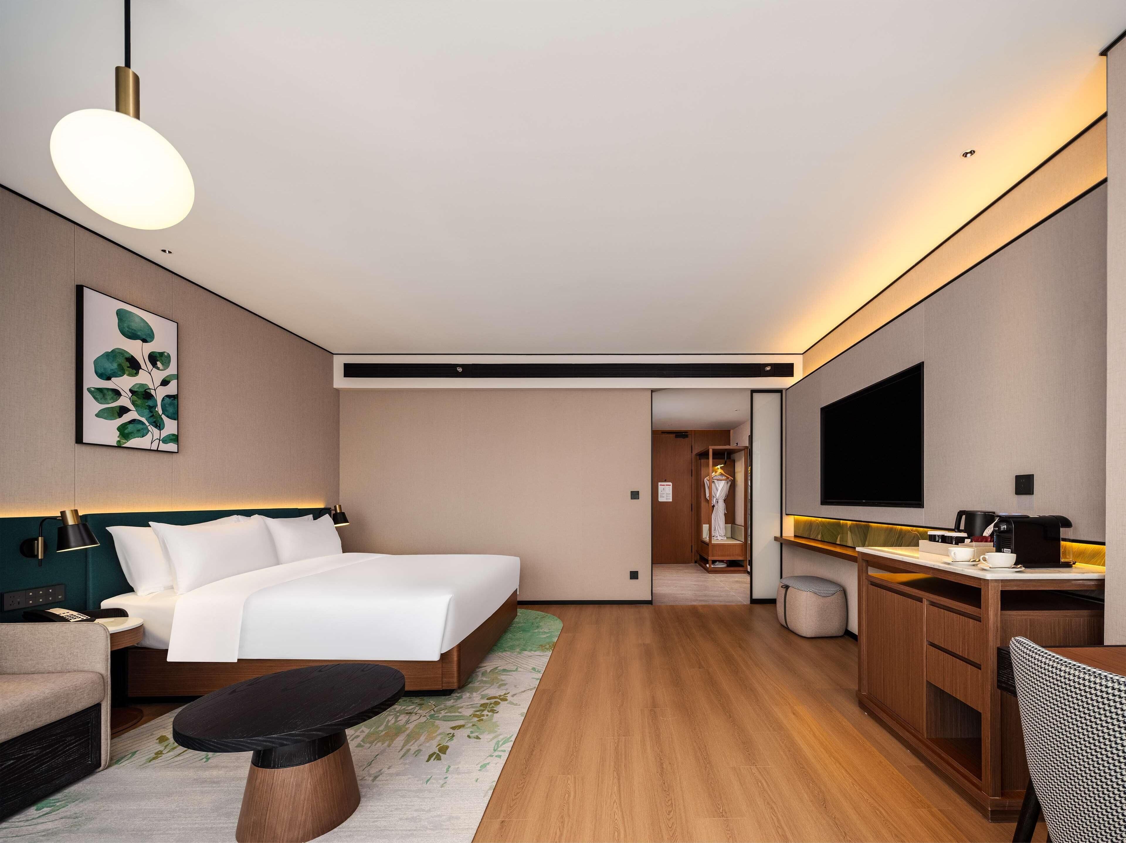 Couette en duvet d'oie, surmatelas, articles gratuits dans le mini-bar