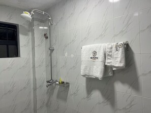 Shower, rainfall showerhead, slippers, towels - Oltotoi suites (Kitengela)