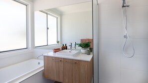 Shower, hair dryer, towels