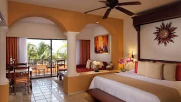 Suite junior, balcón, vista al océano | 1 habitación, caja de seguridad en la habitación y wifi gratis