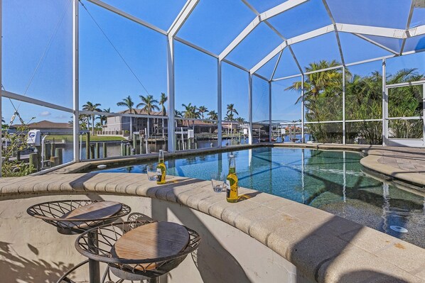 A heated pool - Stunning Luxury! Gulf Access, Pool Table - Villa Harbour Haven - Roelens (Cape Coral)