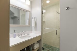 Shower, hair dryer, towels