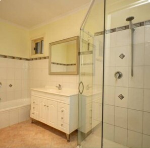 Shower, towels, soap, toilet paper