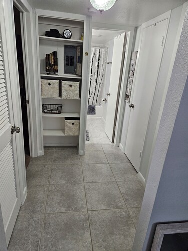 Charming 2-bedroom condo in delightful Titusville wth WiFi AC, pool laundry room