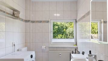 Ducha, secador de pelo, toallas