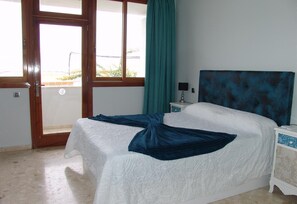 2 dormitorios, tabla de planchar con plancha, wifi gratis y ropa de cama