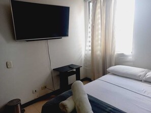 2 habitaciones, tabla de planchar con plancha, wifi y ropa de cama 
