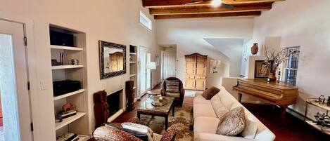 TV, fireplace, books