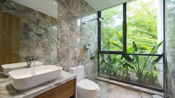 Premier Villa | Bathroom | Shower, rainfall showerhead, hair dryer, slippers