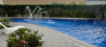 Cozy 1-bedroom Condo near Abreeza Ayala Mall with City View and Free Parking