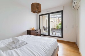 1 bedroom, desk, iron/ironing board, bed sheets