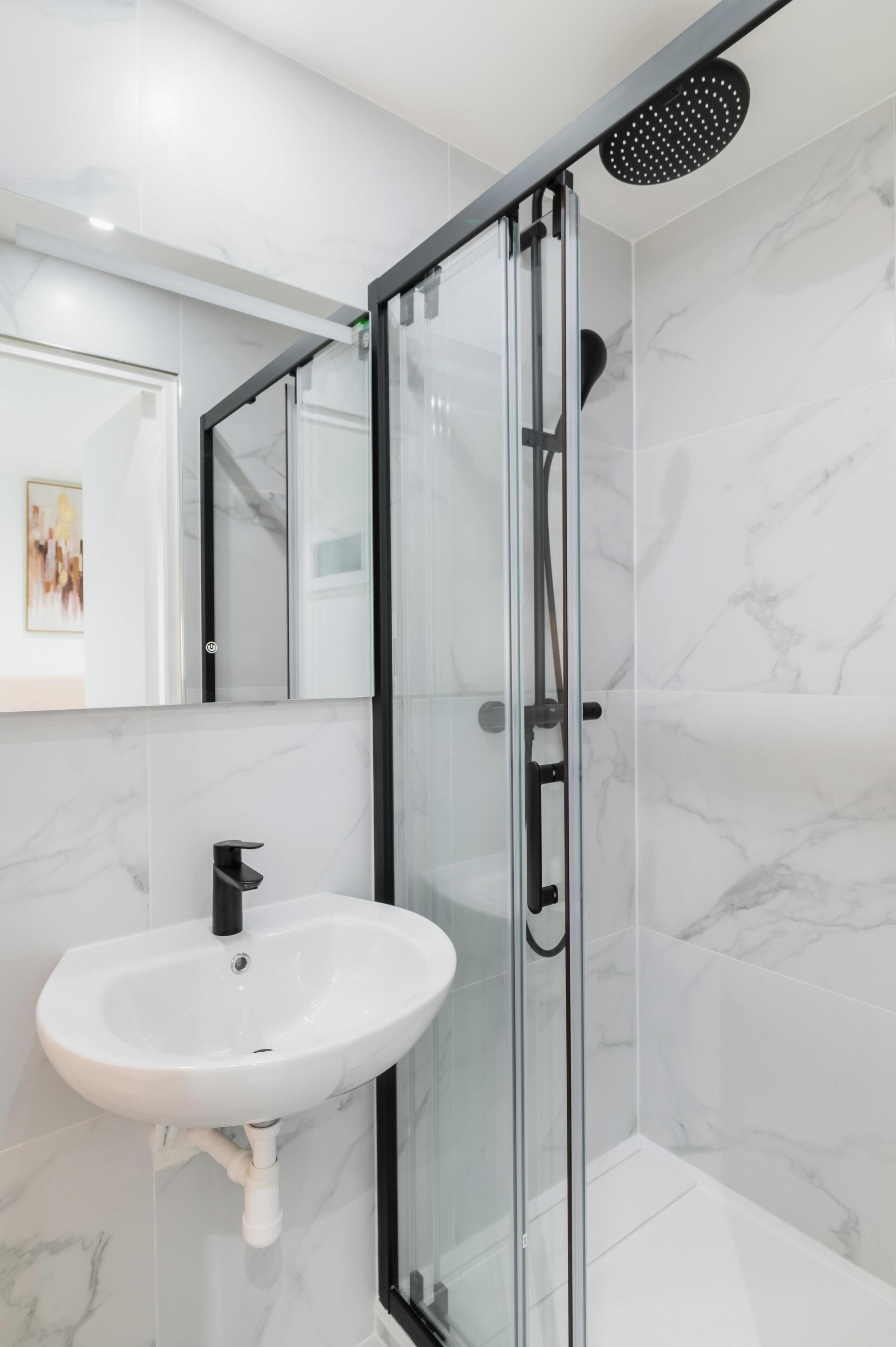 Dutxa, assecador de cabells i tovalloles 