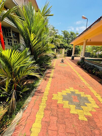 Family-Friendly 3-Bedroom Villa with Private Garden, WiFi & AC in Serene Udupi