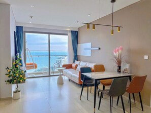 Apartment, 3 Bedrooms, Balcony, Ocean View | Living area | Flat-screen TV, pay movies