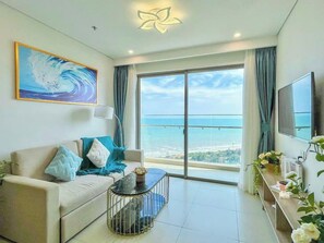 Apartment, 3 Bedrooms, Balcony, Ocean View | Living area | Flat-screen TV, pay movies