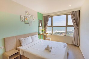 Apartment, 3 Bedrooms, Balcony, Ocean View | Hypo-allergenic bedding, memory foam beds, individually furnished, desk