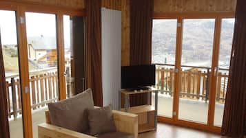 Enjoy a peaceful retreat with a balcony overlooking scenic views of buildings and water.