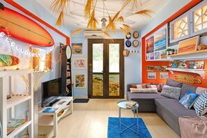 Smart TV, books - The Eclectic Yard home -famous for its Design (Rodos)