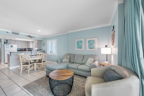 Signature Condo, 2 Bedrooms, Beach View | Living room | 50-inch Smart TV with cable channels