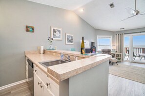 Fridge, microwave, oven, stovetop - Beachside 323 Waterfront Condo on East Grand Traverse Bay (Traverse City)