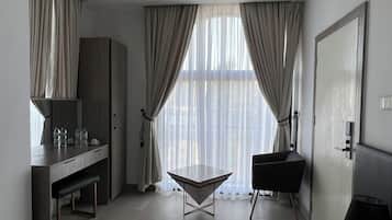 Standard Room, City View | 1 bedroom, desk, laptop workspace, free WiFi