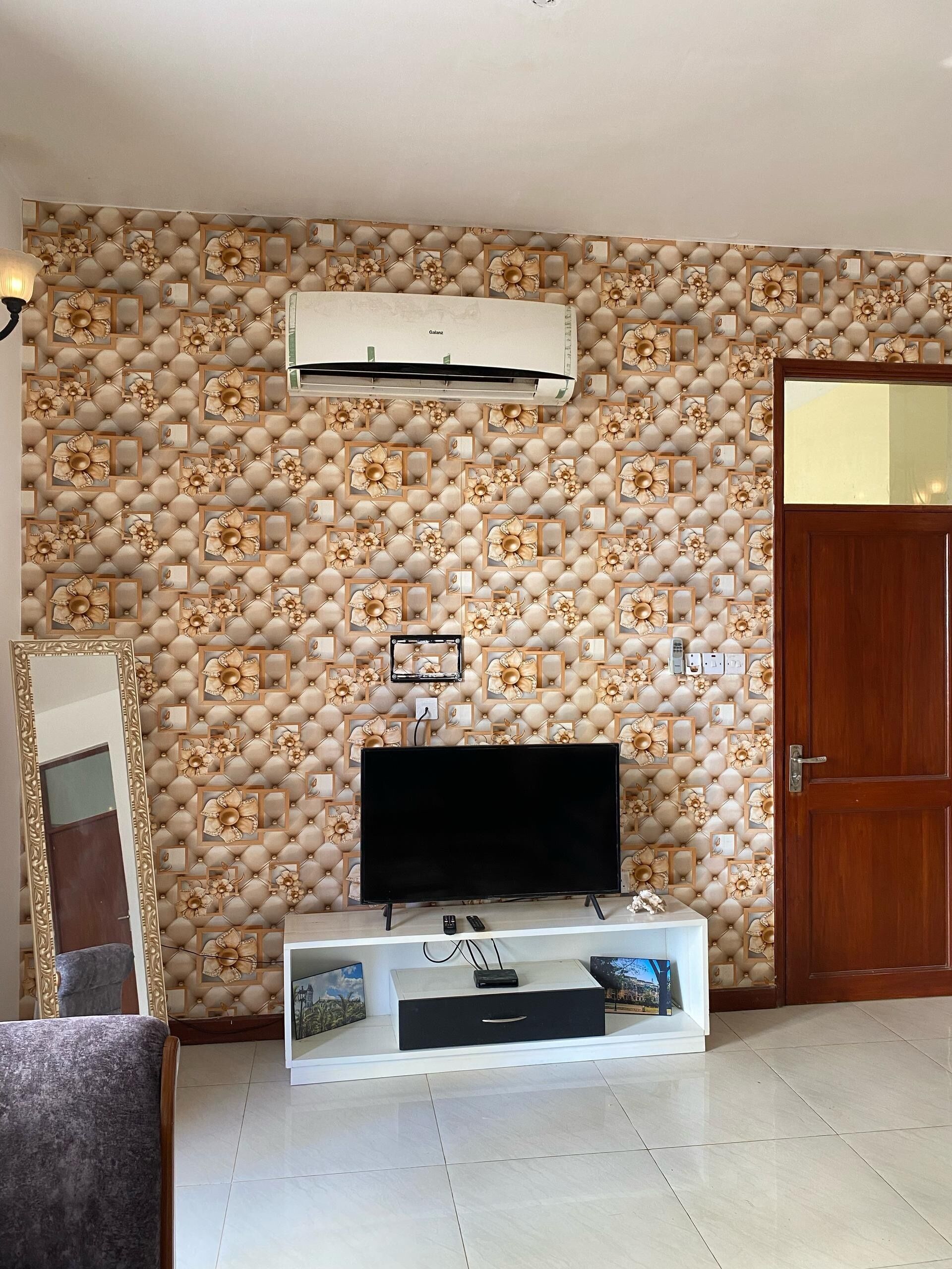 Basic Apartment, Garden View | Living area | Flat-screen TV