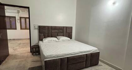 "Divine Retreat: Prime Property Near Durga Temple, 500m from Ganga"