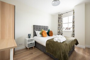 Deluxe Apartment, City View | 2 bedrooms, desk, laptop workspace, iron/ironing board