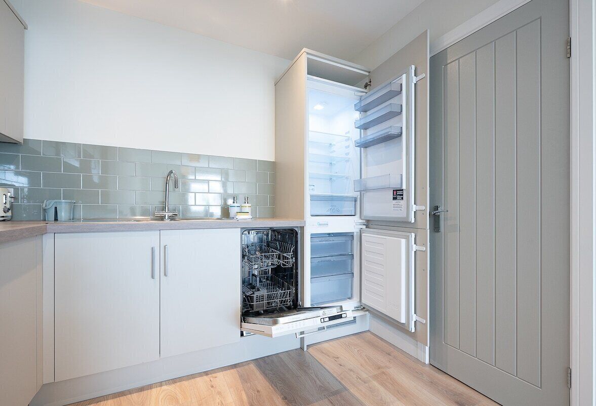 Executive Apartment, Private Bathroom | Private kitchen | Full-sized fridge, microwave, oven, stovetop