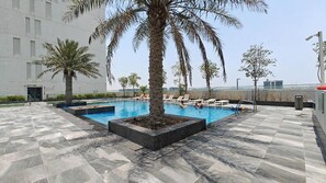 Pool - StayShort - Cozy 1BR in The Pulse Residence, Dubai South! (Dubai South)