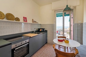 Basic Apartment, Balcony | Private kitchen | Espresso maker, electric kettle