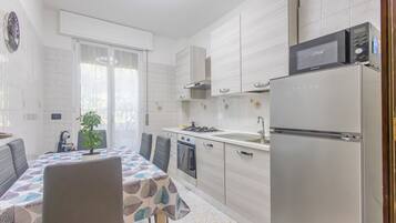 Apartment, Patio | In-room dining